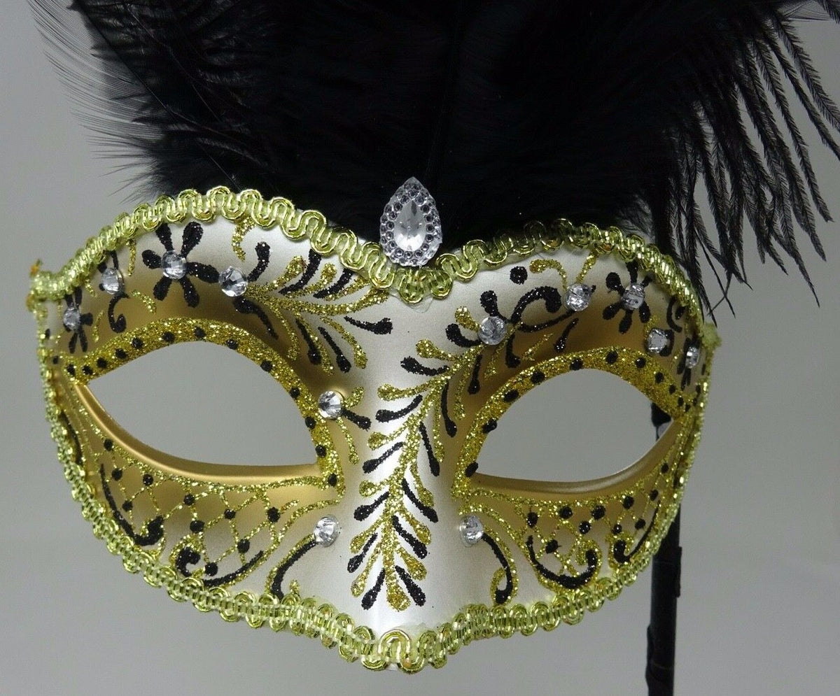 LADIES BLACK & GOLD VENETIAN MASQUERADE PARTY FEATHER MASK ON A HAND HELD STICK