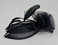Hair Fascinator on a Clear Comb Black Feathers Stiffened Net Fabric Petals 19cm