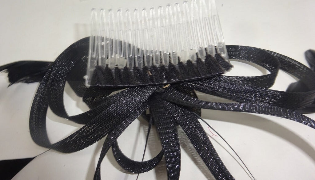 Black Coiled Stiffened Net & Long Feather Fascinator on a Clear Comb Funeral