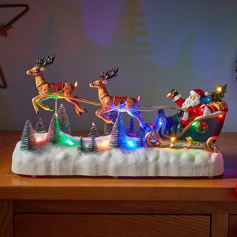 Musical LED Light Up Santa & Sleigh Flying Reindeer Animated Decoratio 39cm Long