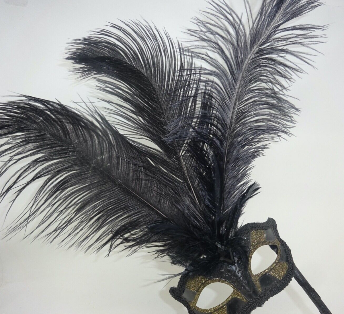 BLACK GOLD MASQUERADE CARNIVAL PARTY BALL WITH LONG FEATHERS EYE MASK ON A STICK