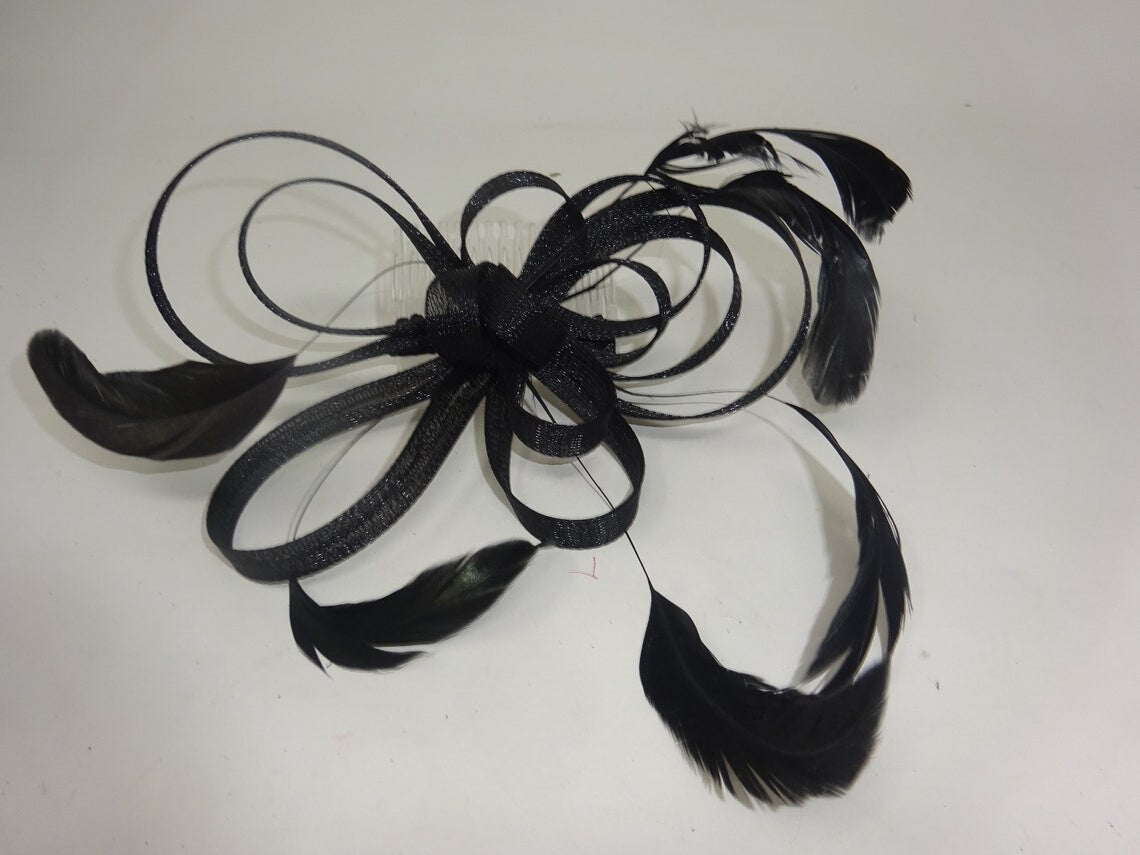 Black Coiled Stiffened Net & Long Feather Fascinator on a Clear Comb Funeral