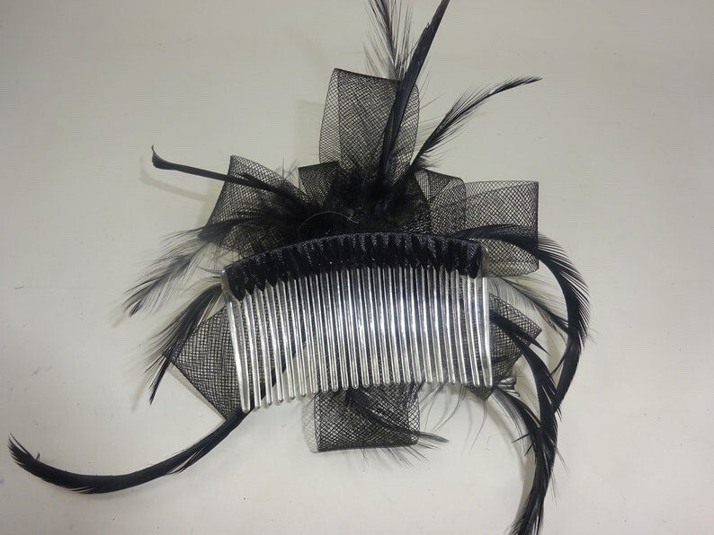 FLORAL ROSETTE DESIGN BLACK LOOP STIFFENED NET ENHANCED WITH LONG SLIM FEATHERS