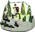 Christmas Snowman Scene LED Light Up Rotating Ice Skaters Carousel 22cm Wide