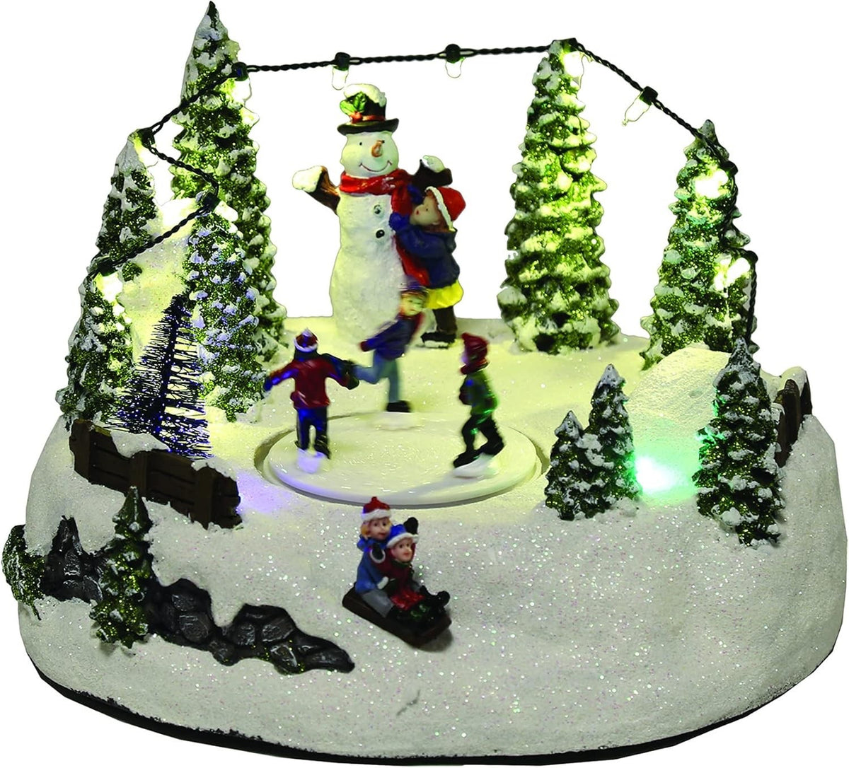 Christmas Snowman Scene LED Light Up Rotating Ice Skaters Carousel 22cm Wide