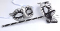 Stunning Black and White His and Hers Couples Masquerade Masks on a Silver Stick with Black Butterfly