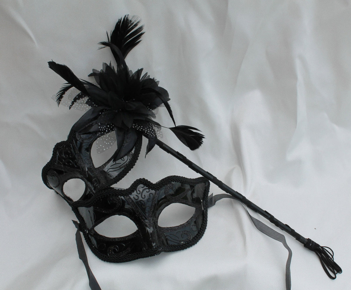 Black His and Hers Couples Masquerade Masks on a Black Stick