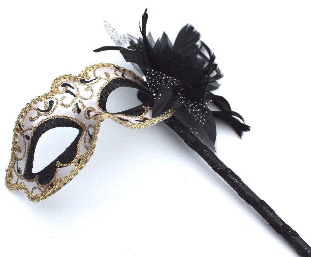 Stunning Black and Gold Flower Masquerade Mask on a Gold Stick