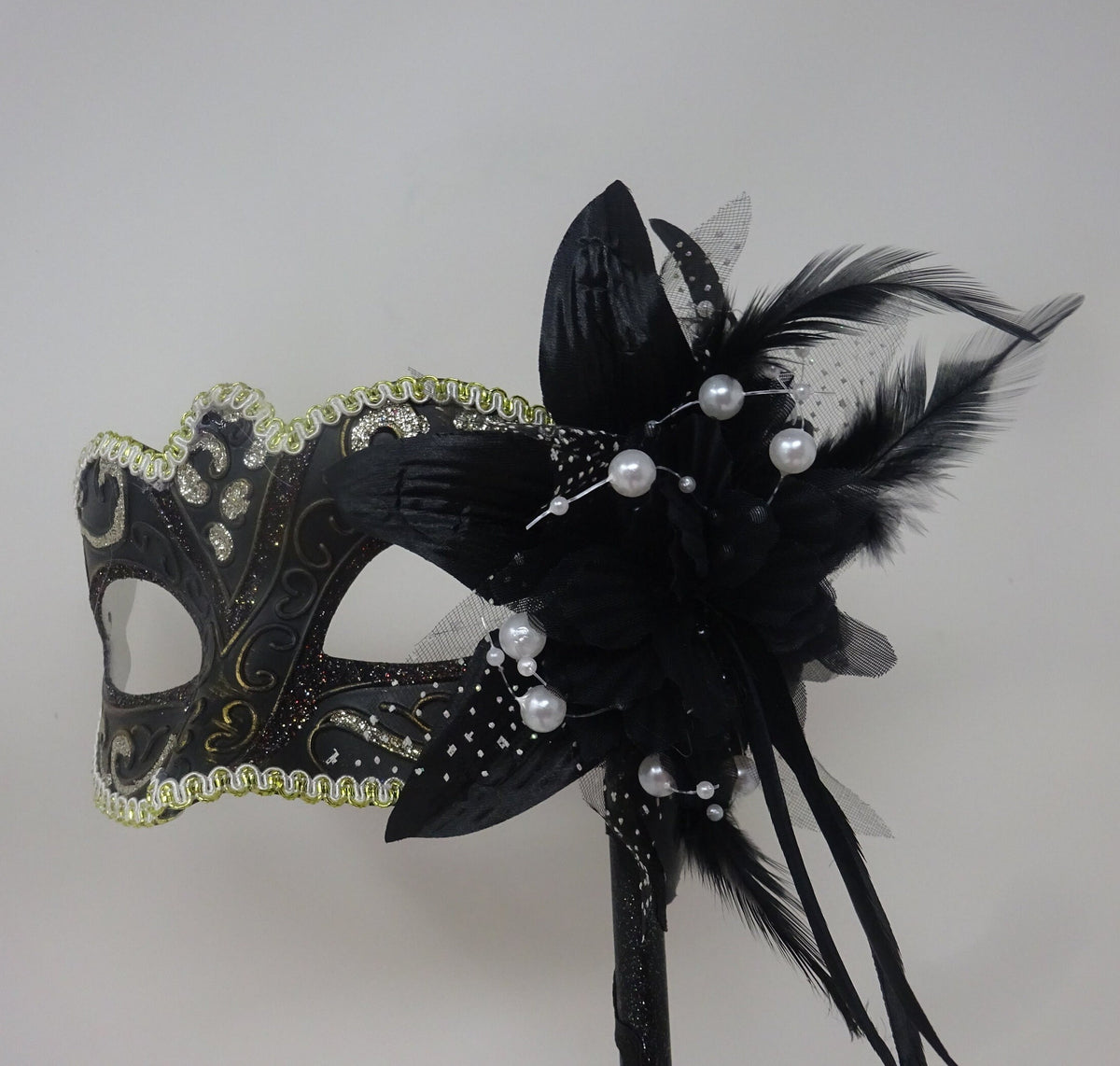 Stunning Black, Bronze Silver and Gold Masquerade Mask on a Black Stick with Flower and Pearls