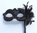 Stunning Black Masquerade Mask on a Black Stick with Black and White Flower