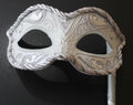 White and Silver Mask on a Silver Stick
