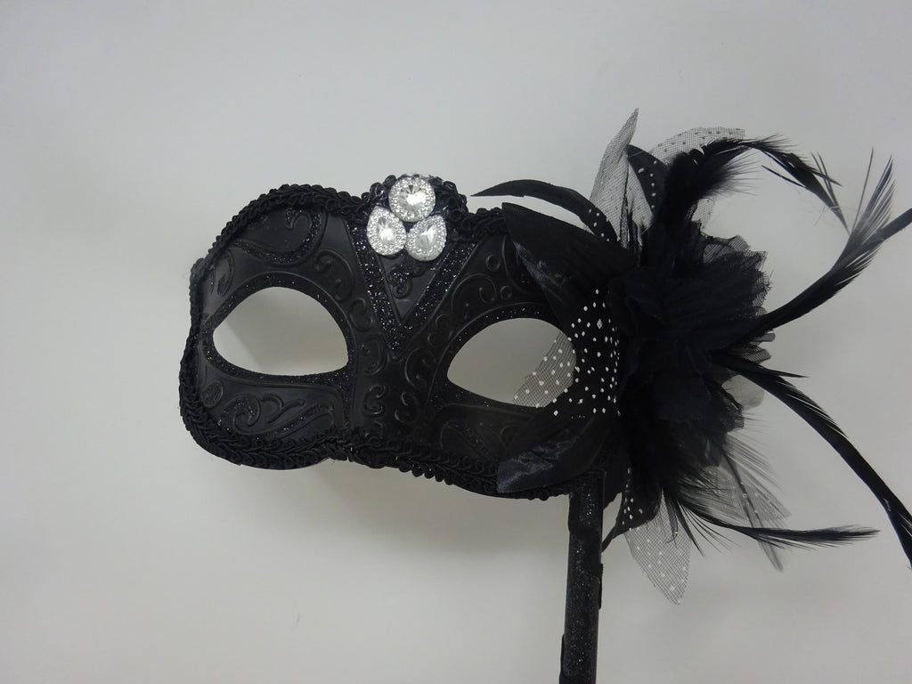 Ladies Black Jewelled Masquerade Mask on a Stick with Flower and Feathers