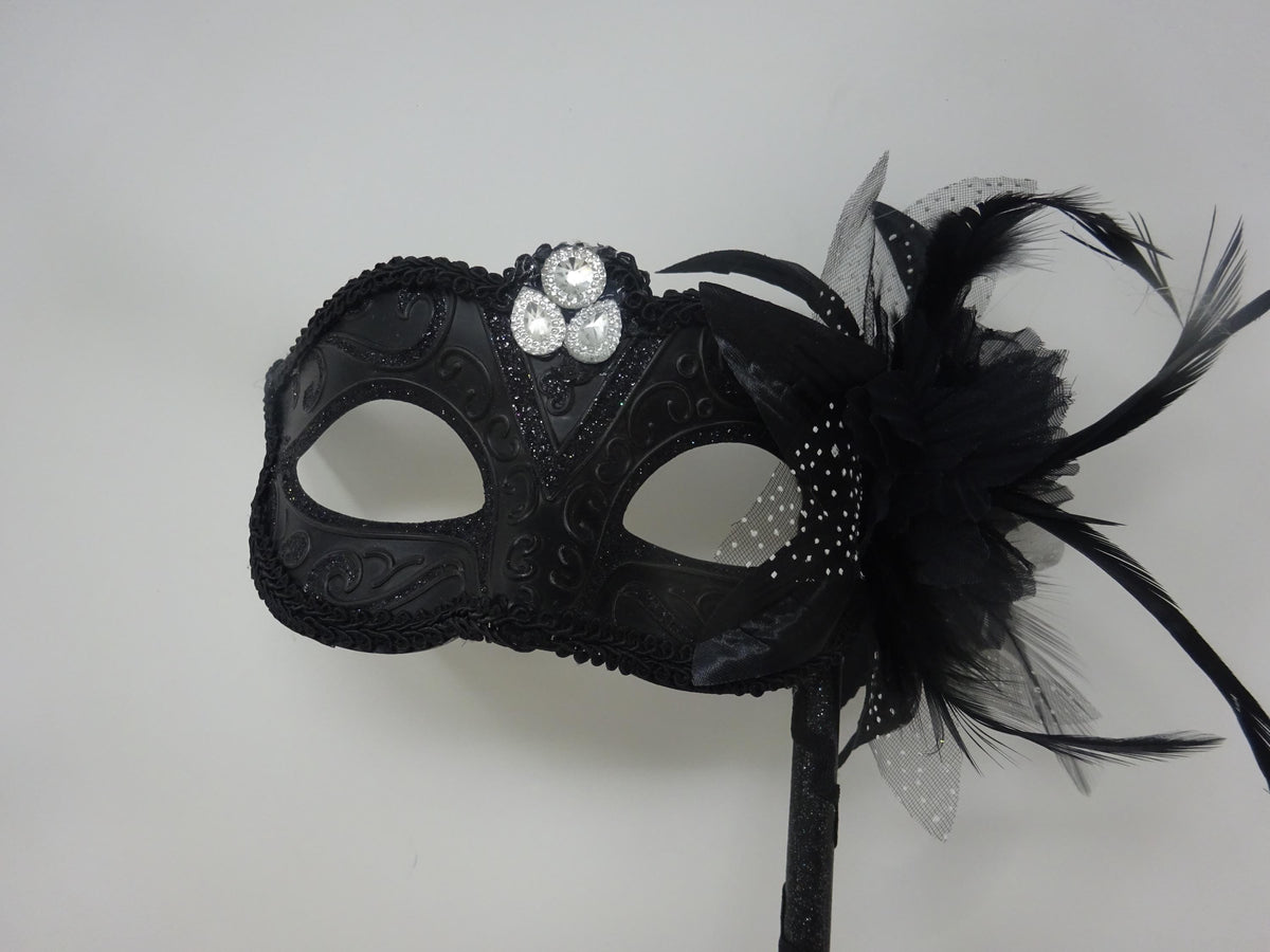 Ladies Black Jewelled Masquerade Mask on a Stick with Flower and Feathers