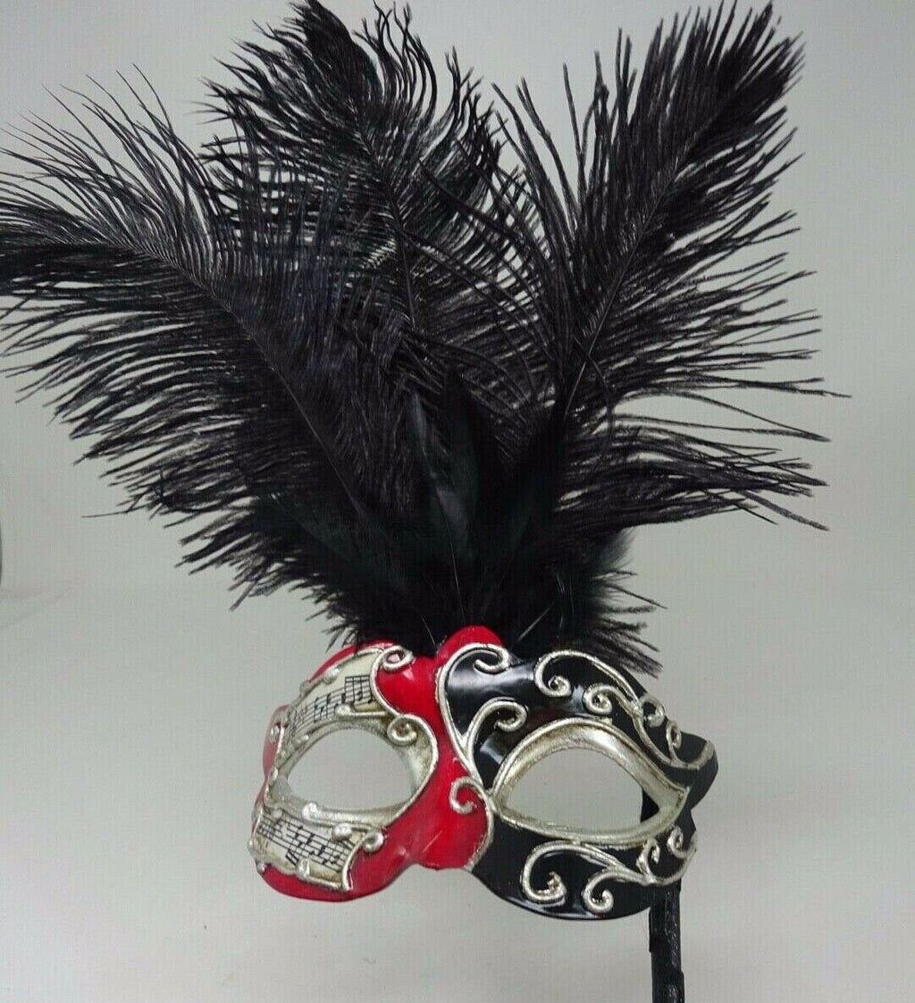 Ladies Red, Black and Silver Musical Masquerade Mask for Masked Ball with Layered Long Black Feathers Hand Held on a Wooden Stick