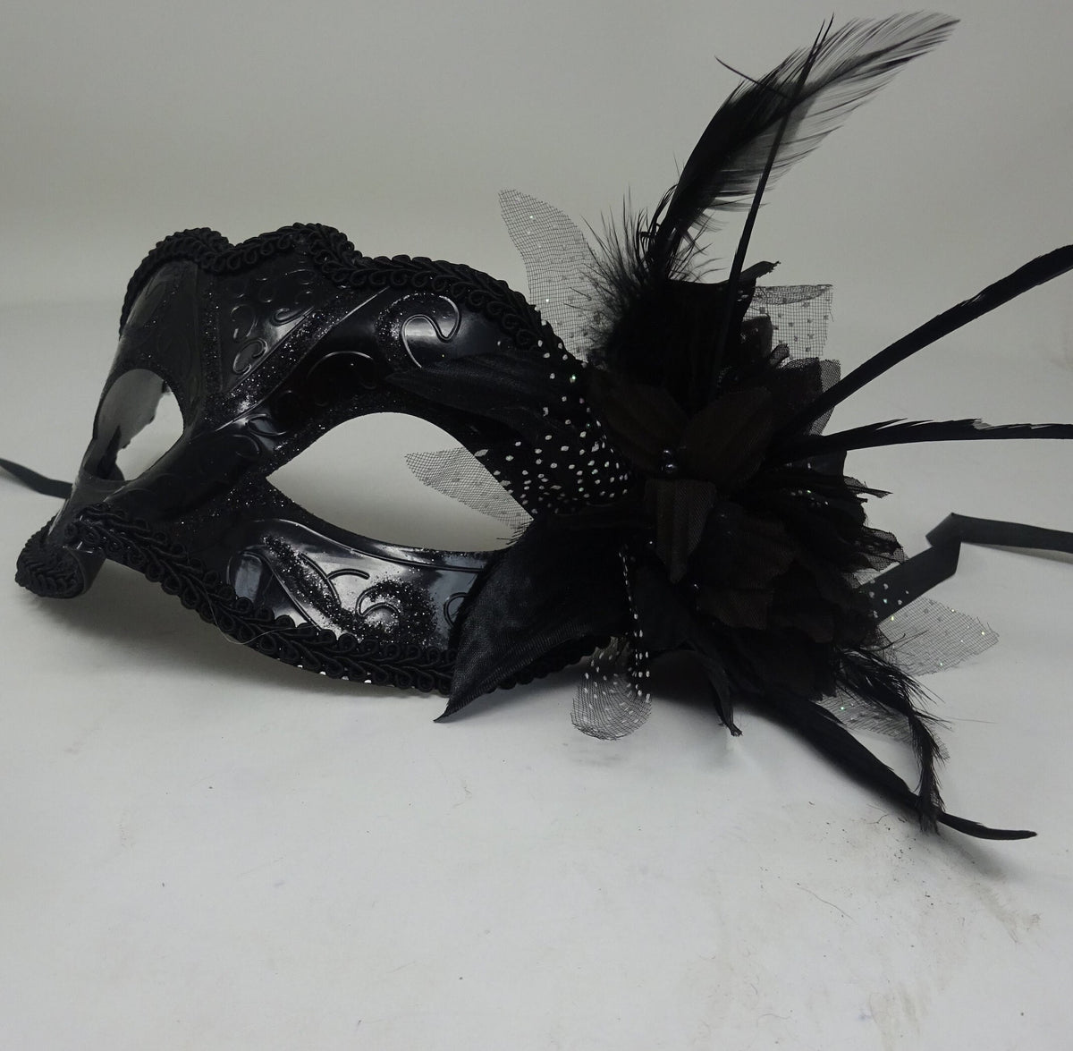 Ladies High Gloss Black Masquerade Mask with Flower and Feather Detail