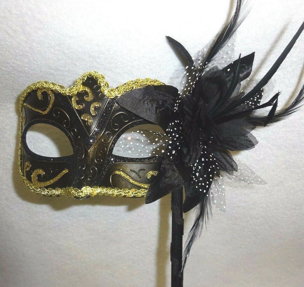 Stunning Black Bronze and Gold Masquerade Mask on a Black Stick with Flower