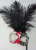 Ladies Red, Black and Silver Musical Masquerade Mask for Masked Ball with Layered Long Black Feathers Hand Held on a Wooden Stick