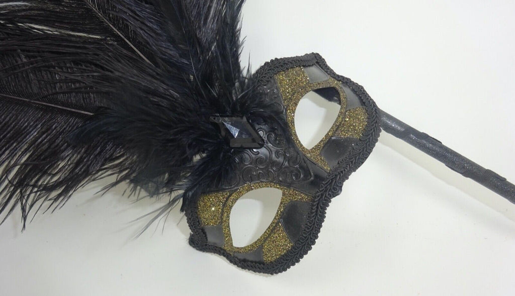 Ladies Black and Gold Masquerade Carnival Mask with Long Feathers and Centre Jewel