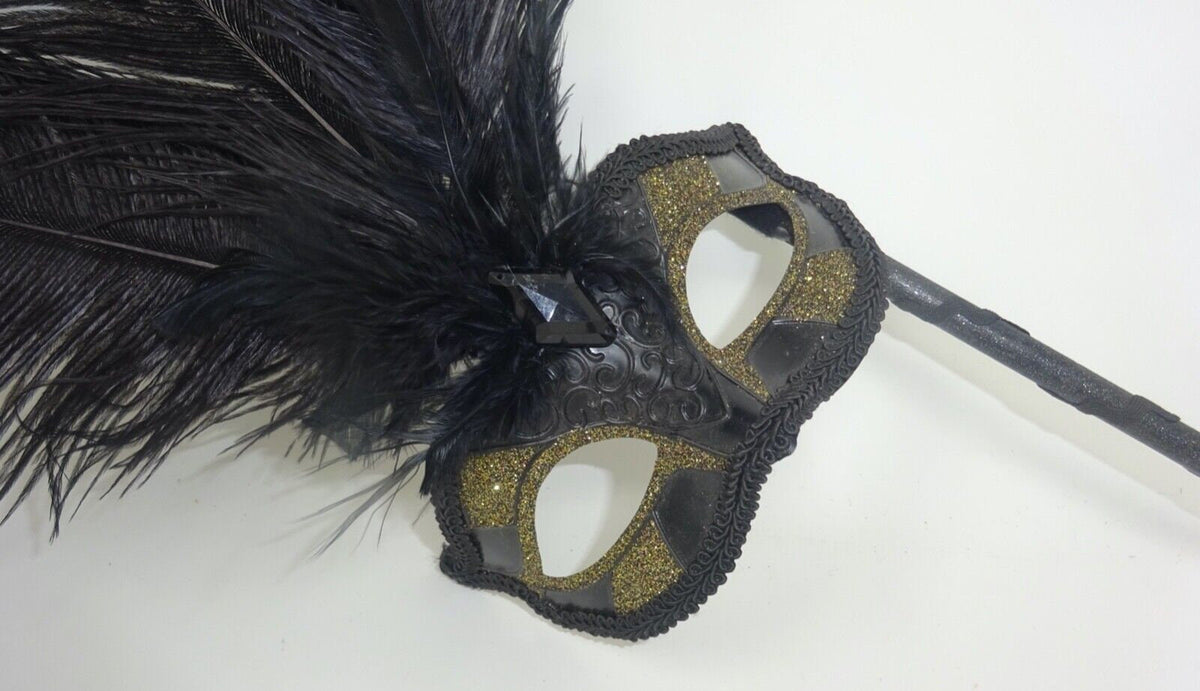 Ladies Black and Gold Masquerade Carnival Mask with Long Feathers and Centre Jewel