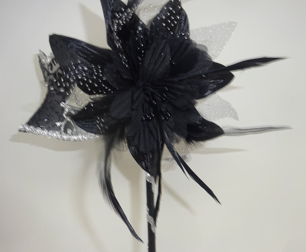 Black and Silver Rialto Masquerade Mask with Flower for Masked Ball Carnival Party Halloween Hand Held on a Wooden Stick