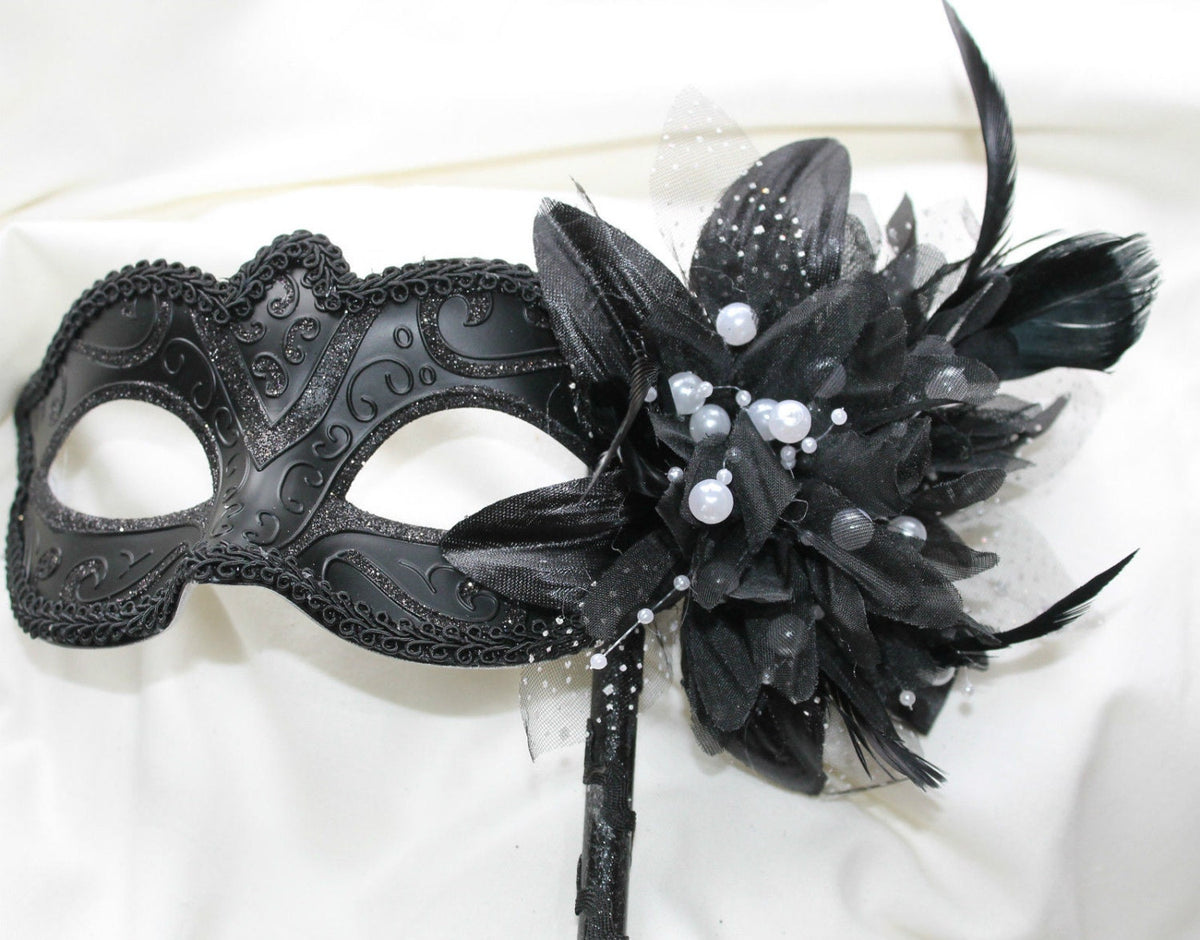 Black Masquerade Mask on a stick with pearl and flower detail