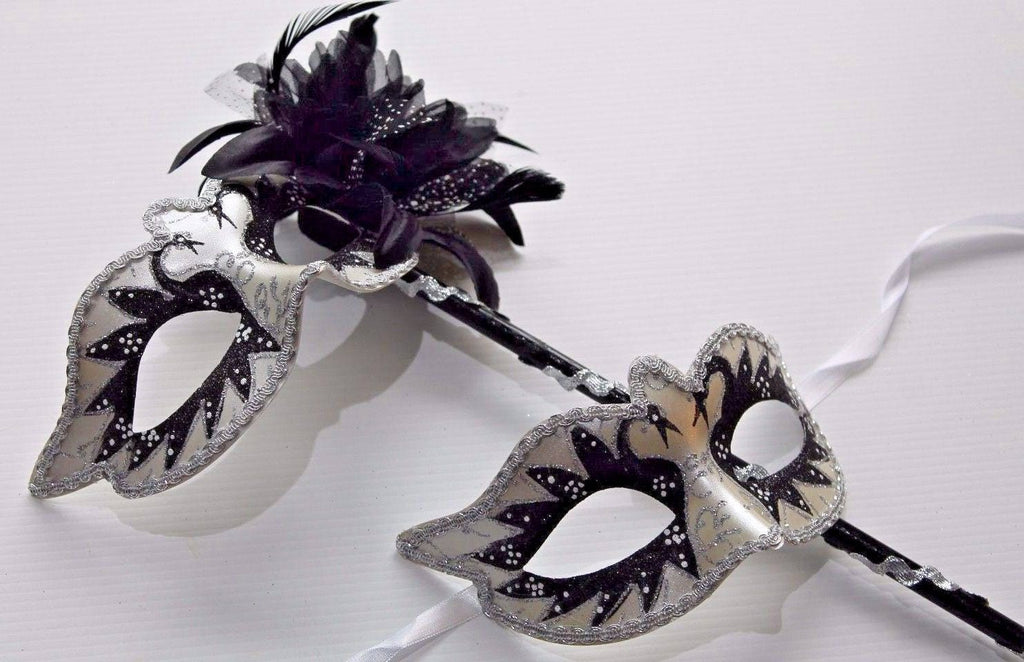 Stunning Black and White His and Hers Couples Masquerade Masks on a Black Stick with Black and White Flower