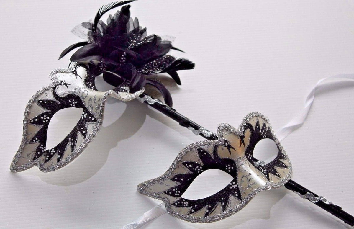 Stunning Black and White His and Hers Couples Masquerade Masks on a Black Stick with Black and White Flower