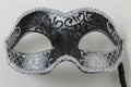 Black and Silver Venetian Masquerade Mask Hand Held on a Stick
