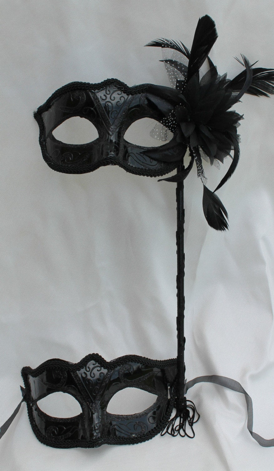 Black His and Hers Couples Masquerade Masks on a Black Stick