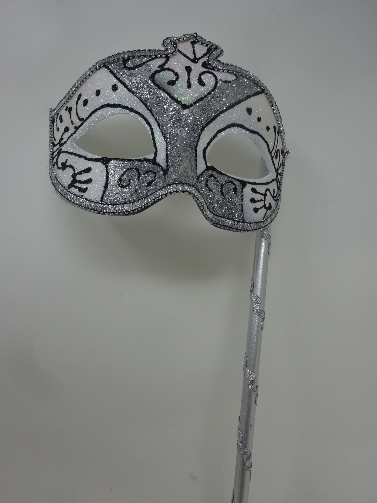 Black  Frosted White and Silver Glitter Mask Hand Held on a Wooden Stick