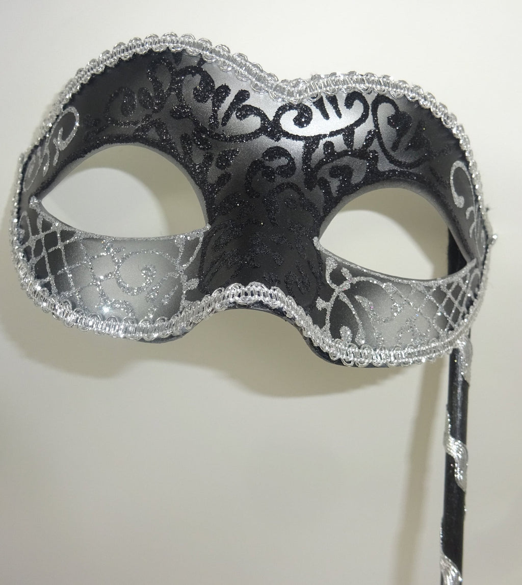 Black and Silver Masquerade Party Carnival Ball Mask on a Silver Stick