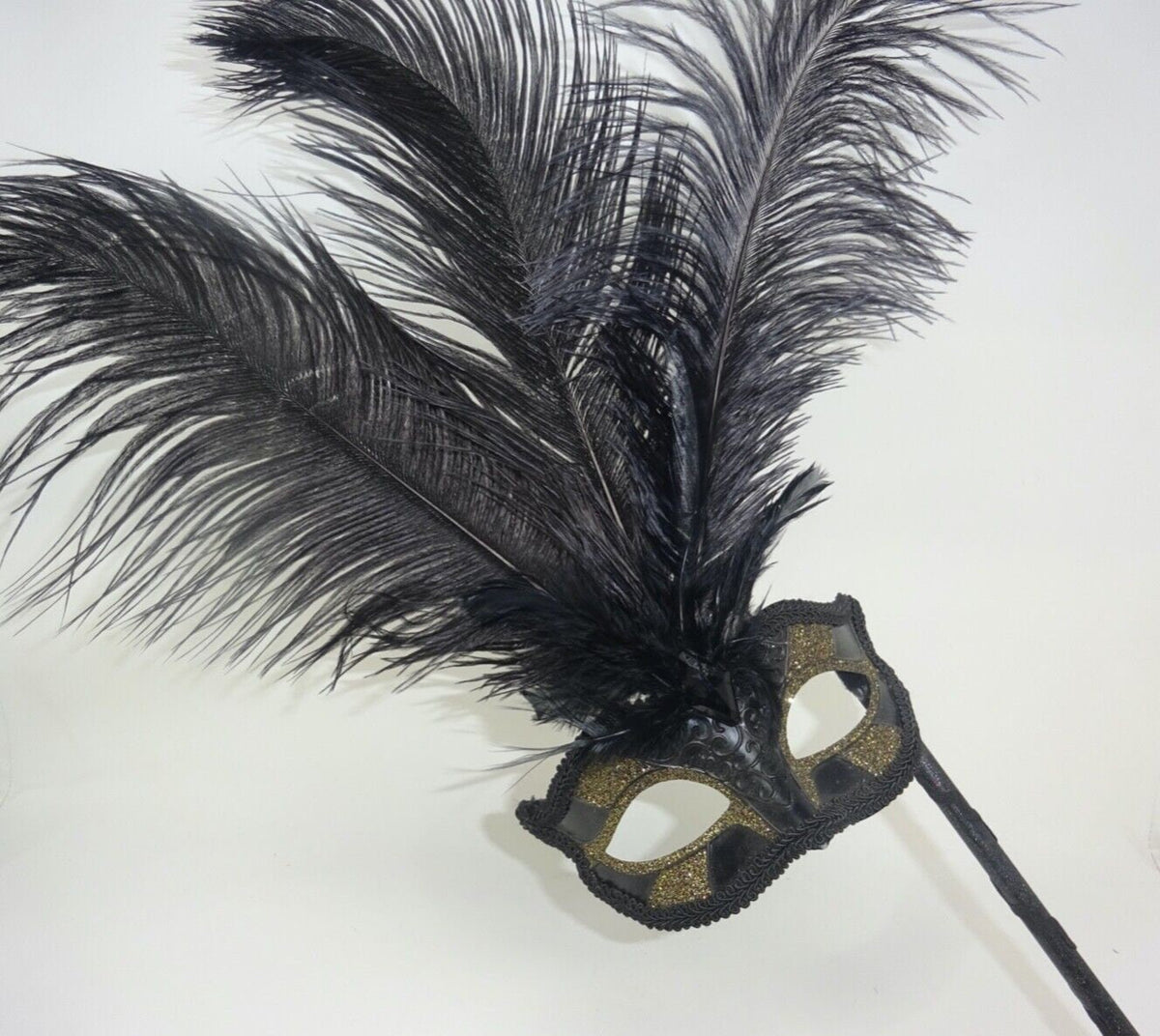 Ladies Black and Gold Masquerade Carnival Mask with Long Feathers and Centre Jewel