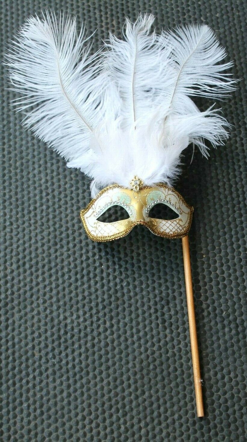 White and Gold Feather Masquerade Mask on a Gold Stick with Diamontes