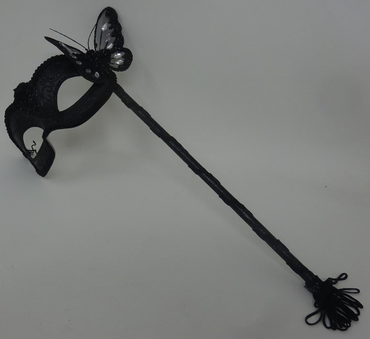 Black Venetian Masquerade Ball Party Carnival Mask with Black Butterfly Details on a Hand Held Stick